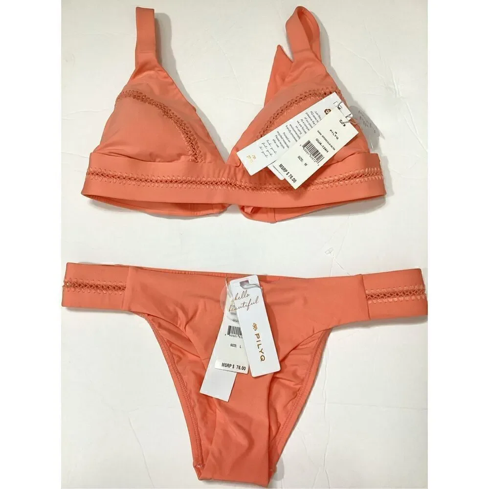 New. Pilyq coral stitched teeny bikini. M-top/L-bottom. Retails $179